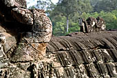 Angkor Thom - Bayon temple, central terrace, corner frontons 